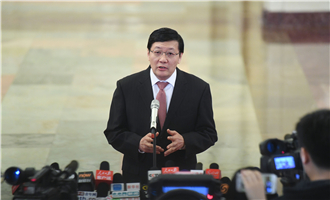 全國社?；鹄硎聲硎麻L樓繼偉接受采訪