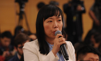 光明日?qǐng)?bào)記者提問