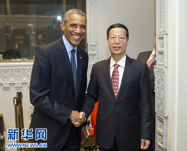 9月23日，國家主席習(xí)近平特使、國務(wù)院副總理張高麗在紐約會見出席聯(lián)合國氣候峰會的美國總統(tǒng)奧巴馬。 新華社記者王曄攝