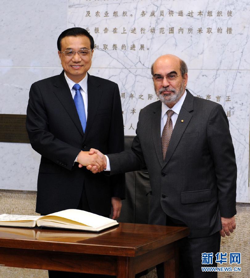 10月15日，中國(guó)國(guó)務(wù)院總理李克強(qiáng)在羅馬會(huì)見聯(lián)合國(guó)糧農(nóng)組織總干事格拉齊亞諾。 新華社記者 饒愛民 攝