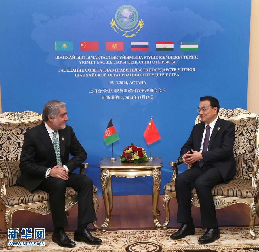 12月15日，中國國務(wù)院總理李克強在阿斯塔納會見阿富汗首席執(zhí)行官阿卜杜拉。 新華社記者 龐興雷 攝