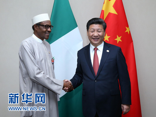 12月4日，國(guó)家主席習(xí)近平在約翰內(nèi)斯堡會(huì)見(jiàn)尼日利亞總統(tǒng)布哈里。 新華社記者 龐興雷 攝 