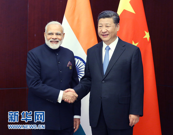 6月9日，國家主席習(xí)近平在阿斯塔納會見印度總理莫迪。 新華社記者姚大偉 攝