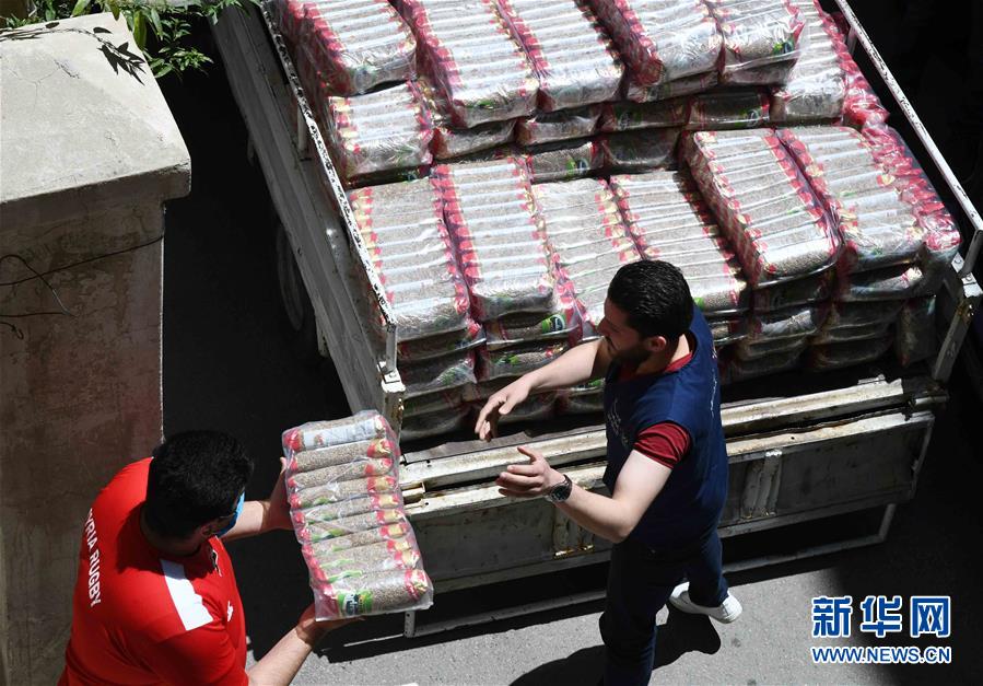 （國際疫情&middot;圖文互動(dòng)）（1）通訊：疫情中，那抹笑容最難忘&mdash;&mdash;記向困難家庭發(fā)放愛心包裹的敘利亞青年志愿者